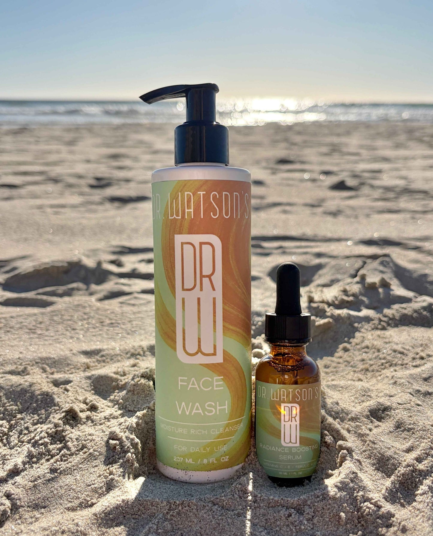 Facial brightening duo: face wash pump bottle and vitamin C serum dropper bottle
