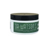 Dr. Watson's hair cream jar close-up with black lid and green label.