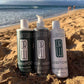 Three Dr. Watson's bottles—shampoo, body wash, and conditioner