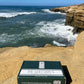 Dr. Watson's collection box, black carton with DR W logo on lid